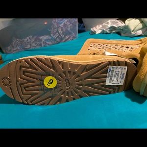 NWT Ugg boots, never worn. Size 9. $30.